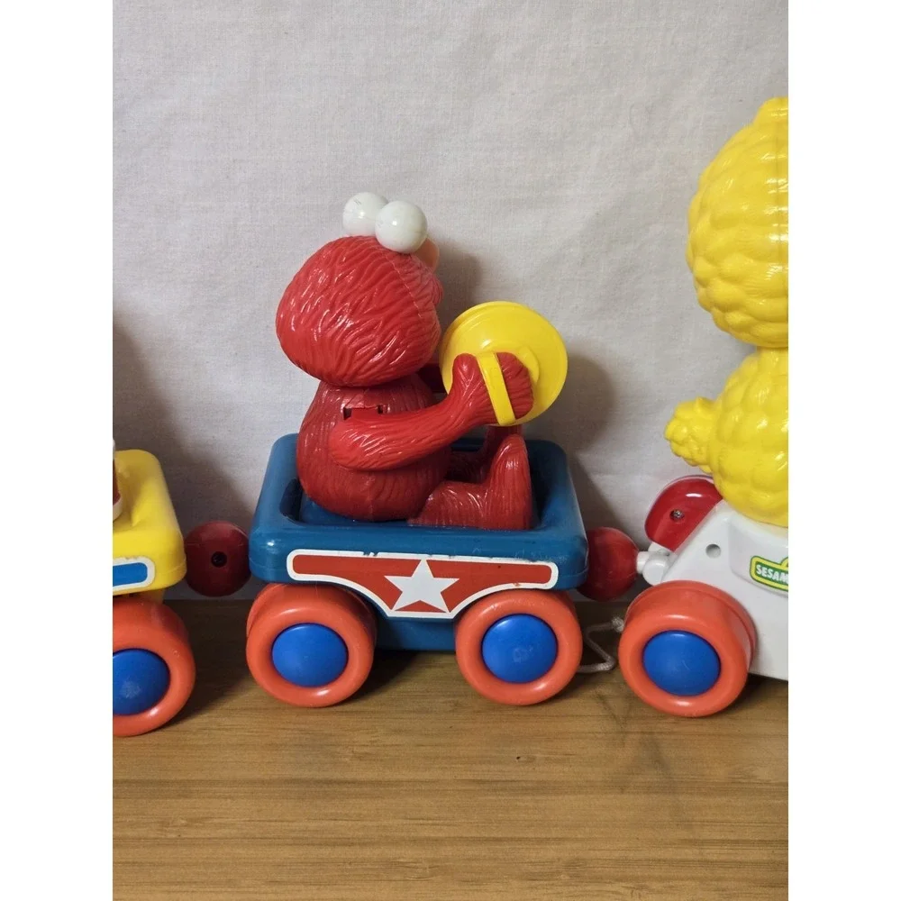 Vintage Sesame Street Parade Band TYCO Pull Train 16